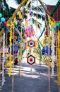 Colorful hanging mobile decorative on bamboo wood arch background