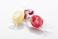 Colorful hard candies on white background