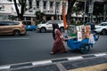 Colorful hawkers sell food by the street in Jakarta