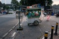 Colorful hawkers sell food by the street in Jakarta