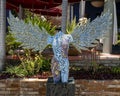 Colorful headless female angel sculpture in the courtyard of the La Coronela Restaurnt & Bar in Todos Santos.