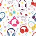 Colorful headphones background. Abstract music seamless pattern with earphones and notes. Musical childish fabric print Royalty Free Stock Photo