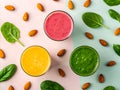 Colorful Healthy Smoothie Bowls with Almonds and Spinach Royalty Free Stock Photo