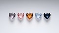 Colorful Heart-Shaped Crystals Displayed on Soft Gradient Background for Decorative Use Royalty Free Stock Photo