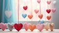 Colorful hearts hanging on a rope on a white wooden table. Generative AI Royalty Free Stock Photo
