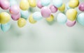 Colorful helium balloons on retro pastel background. Birthday celebration and baby shower decor. Minimal creative idea for party Royalty Free Stock Photo
