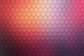 Colorful hexagon grid gradient background with honeycomb geometric pattern in warm orange pink and purple Royalty Free Stock Photo
