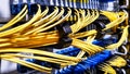 Colorful high speed optical fiber cables connected to the cloud network servers