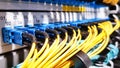 Colorful high speed optical fiber cables connected to the cloud network servers equipment switch inside modern big data center