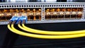 Colorful high speed optical fiber cables connected to the cloud network servers equipment switch inside modern big data center Royalty Free Stock Photo