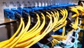 Colorful high speed optical fiber cables connected to the cloud network servers equipment switch inside modern big data center Royalty Free Stock Photo