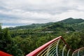 Colorful hillside steel railing in cloudy summer,Danjing Mountain