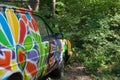 Colorful hippie machine in the forest