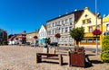 Colorful historic tenement houses at Rynek main market square in old town quarter of Trzebiatow in Poland