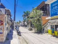 Colorful Holbox island village with stores mud and people Mexico
