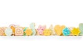 Colorful homemade christmas cookies in front of white background