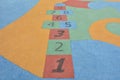 Colorful hopscotch made on the floor of a playground Royalty Free Stock Photo
