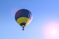 Colorful hot air balloon flying in the blue sky Royalty Free Stock Photo