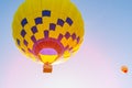 Colorful hot air balloon flying in the blue sky Royalty Free Stock Photo