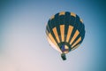 Colorful hot air balloon flying in the blue sky Royalty Free Stock Photo