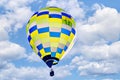 Hot air balloon flight over blue sky