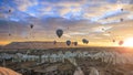 Colorful hot air balloon flying over Cappadocia at sunrise Royalty Free Stock Photo