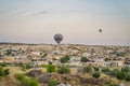 Colorful hot air balloon flying over Cappadocia, Turkey Royalty Free Stock Photo