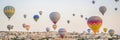 Colorful hot air balloon flying over Cappadocia, Turkey BANNER, LONG FORMAT Royalty Free Stock Photo