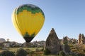 Colorful hot air balloon flying over Cappadocia Turkey Royalty Free Stock Photo