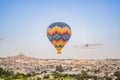 Colorful hot air balloon flying over Cappadocia, Turkey Royalty Free Stock Photo