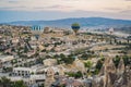 Colorful hot air balloon flying over Cappadocia, Turkey Royalty Free Stock Photo