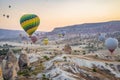 Colorful hot air balloon flying over Cappadocia, Turkey Royalty Free Stock Photo