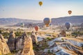 Colorful hot air balloon flying over Cappadocia, Turkey Royalty Free Stock Photo