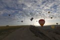 Colorful hot air balloon flying over Cappadocia, Turkey. Royalty Free Stock Photo