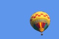 Colorful hot air balloon isolate on blue sky background Royalty Free Stock Photo