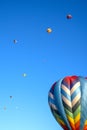 Colorful hot air balloons against blue sky, Balloon Festival. Space for text Royalty Free Stock Photo