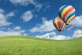 Colorful Hot Air Balloons In Beautiful Blue Sky Above Grass Field Royalty Free Stock Photo