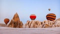 Colorful hot air balloons begining to fly at sunrise in Cappadocia Royalty Free Stock Photo