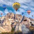 Colorful hot air balloons flying over Cappadocia, Turkey Royalty Free Stock Photo