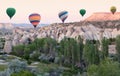 Colorful hot air balloons flying over Cappadocia, Turkey Royalty Free Stock Photo