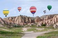 Colorful hot air balloons flying over Cappadocia, Turkey Royalty Free Stock Photo