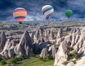 Colorful hot air balloons flying over Cappadocia, Turkey Royalty Free Stock Photo