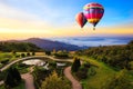 Colorful hot-air balloons flying over the mountain Royalty Free Stock Photo