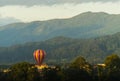 Colorful hot-air balloons flying over the mountain Royalty Free Stock Photo