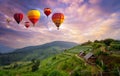 Colorful hot air balloons flying over mountain in sunrise at Khun Pae, Chiang Mai, Thailand Royalty Free Stock Photo