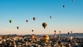 Colorful hot air balloons flying over rock landscape at Cappadocia Turkey Royalty Free Stock Photo
