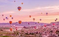 Colorful hot air balloons flying over rock landscape at Cappadocia Turkey Royalty Free Stock Photo