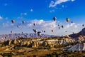 Colorful hot air balloons flying over the valley at Cappadocia, Anatolia, Turkey. Royalty Free Stock Photo