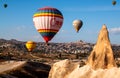 Colorful hot air balloons flying over the valley at Cappadocia, Anatolia, Turkey. Royalty Free Stock Photo