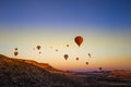 Colorful hot air balloons flying over the valley Royalty Free Stock Photo